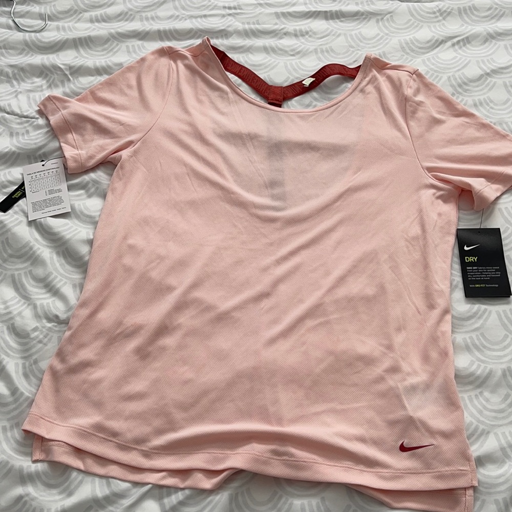 Nike dry fit sports top, peach color, size M